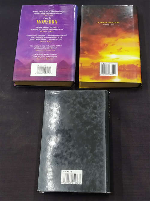 Trio of Wilbur Smith Books with Dust Jackets-Warlock, Triumph of the Sun and Seventh Scroll