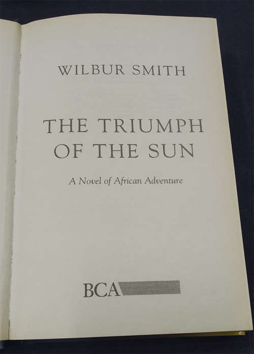 Trio of Wilbur Smith Books with Dust Jackets-Warlock, Triumph of the Sun and Seventh Scroll