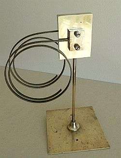 ANTIQUE CHIME GONG WITH TWO FLAT METAL COILS AND BRASS PARTS