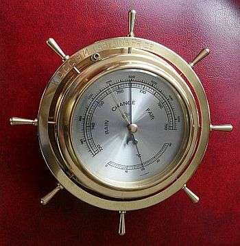 SHIP'S WHEEL BAROMETER + THERM.,SOLID BRASS,BARIGO "K.D.C.C.1974 CAPTAINS PRIZE"