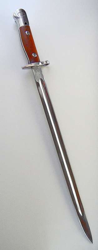 PARADE BAYONET WITH ORIGINAL SCABBARD  WITH SEVERAL MARKINGS VERY GOOD CONDITION