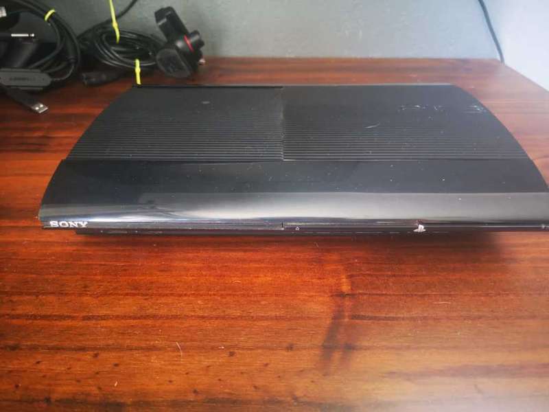 PS3 - 12GB Super Slim Console + 2 Controllers + Move Controller + Games
