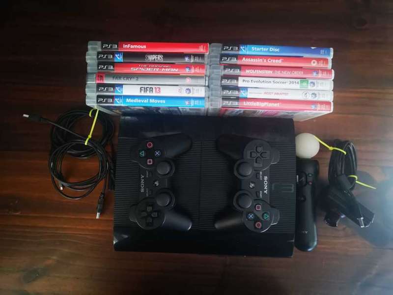 PS3 - 12GB Super Slim Console + 2 Controllers + Move Controller + Games