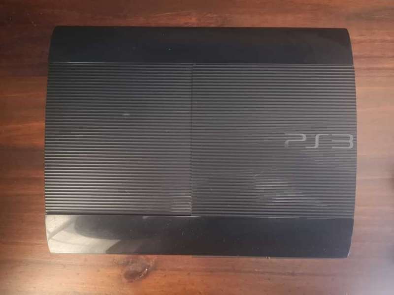 PS3 - 12GB Super Slim Console + 2 Controllers + Move Controller + Games
