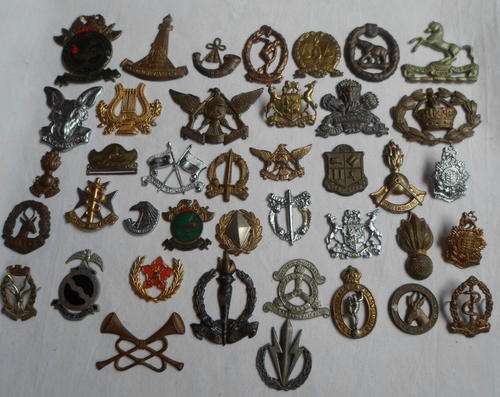 SELECTION OF SA BADGES-SOLD TOGETHER-40 IN TOTAL-THERE IS MISSING PINS & LUGS