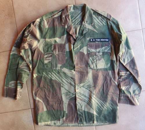 RHODESIAN CAMO LONG SLEEVE SHIRT BELONGED TO SERGEANT R.A. VAN ROOYEN-HE WAS ON HELICOPTERS-SIZE EXT