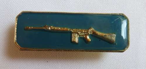 SAAF INSTRUCTOR QUALIFICATION BREAST BADGE-GOLD RIFLE IN BLUE- 2 PINS
