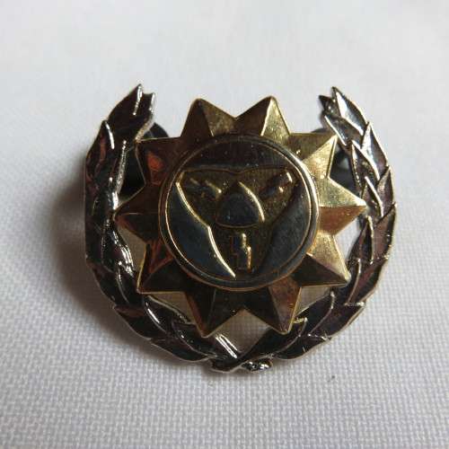 SAAF ARMOURERS BI METAL BREAST BADGE-APPROVED IN 1997- 2 PINS