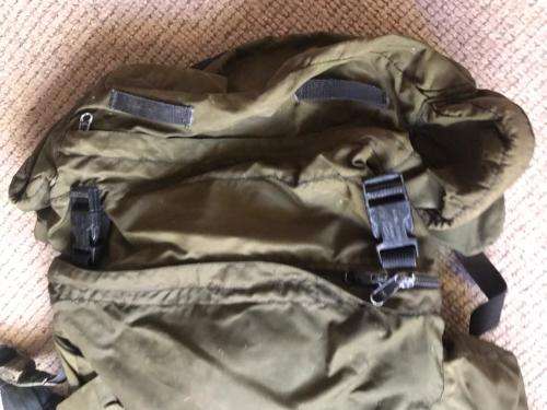 RECCE USED,OLIVE GREEN BACKPACK WITH NO METAL FRAME-ORIGINAL WITH SOME RECCE CAMO TAPE STILL ON IT