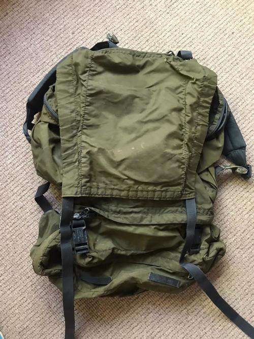 RECCE USED,OLIVE GREEN BACKPACK WITH NO METAL FRAME-ORIGINAL WITH SOME RECCE CAMO TAPE STILL ON IT