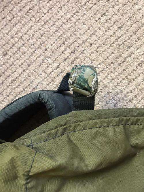RECCE USED,OLIVE GREEN BACKPACK WITH NO METAL FRAME-ORIGINAL WITH SOME RECCE CAMO TAPE STILL ON IT