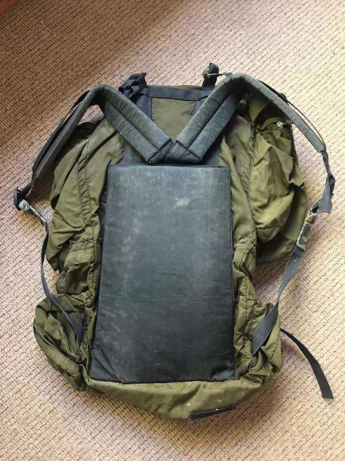 RECCE USED,OLIVE GREEN BACKPACK WITH NO METAL FRAME-ORIGINAL WITH SOME RECCE CAMO TAPE STILL ON IT