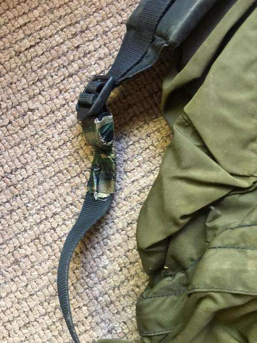 RECCE USED,OLIVE GREEN BACKPACK WITH NO METAL FRAME-ORIGINAL WITH SOME RECCE CAMO TAPE STILL ON IT