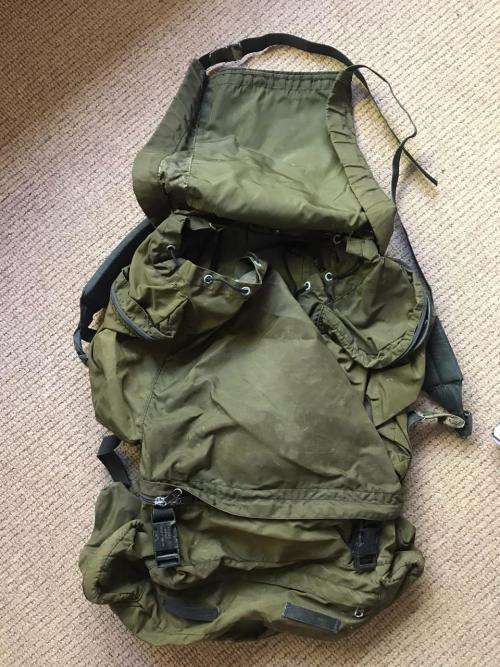 RECCE USED,OLIVE GREEN BACKPACK WITH NO METAL FRAME-ORIGINAL WITH SOME RECCE CAMO TAPE STILL ON IT