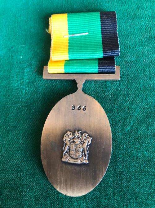 FULL SIZE SERVICE MEDAL IN BRONZE FOR YEARS SERVICE TO MK