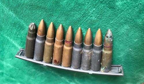 7,62 MM X 39 AMMO ON 10 ROUND STRIPPER DIP FOR THE SOVIET SIMONAV SEMI AUTOMATIC CARBINE (SKS