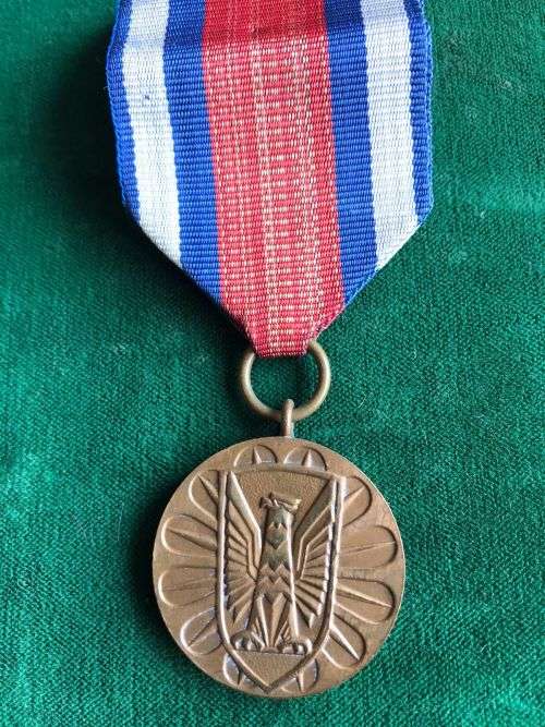 FULL SIZE POLISH MEDAL OF MERIT FOR SAVEGUARDING PUBLIC-3RD CLASS ORDER IN BRONZE