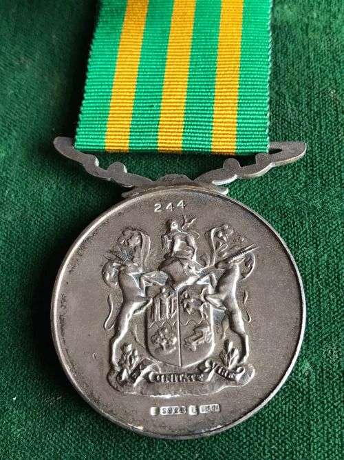 FULL SIZE SILVER DANIE THERON MEDAL (DTM)1970-1997-SA MINT AND SILVER MARKINGS ON THE BACK-NUMBERED
