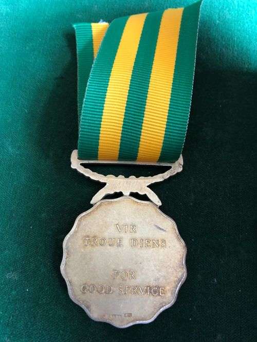 FULL SIZE GOOD SERVICE MEDAL NUMBERED 1534 ON RIM-GOLD-1975- 30 YEARS