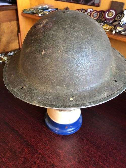BRITISH STEEL HELMET WW2 WITH HOLES ON THE BACK RIM FOR SHADE FLAP-MADE IN SA AND USED IN NORTH AFRI