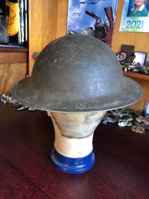 BRITISH STEEL HELMET WW2 WITH HOLES ON THE BACK RIM FOR SHADE FLAP-MADE IN SA AND USED IN NORTH AFRI