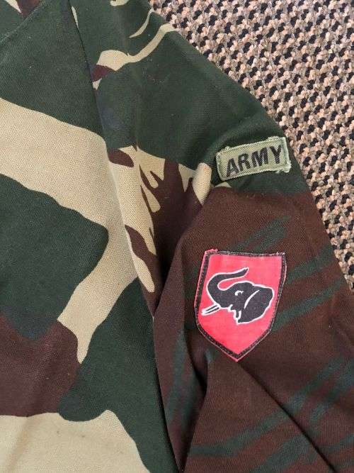 RHODESIAN CAMO TRACKSUIT TOP-SIZE MEDIUM-MEASURES 55CM ARMPIIT TO ARMPIT-MAKERS LABEL AND IN VERY GO