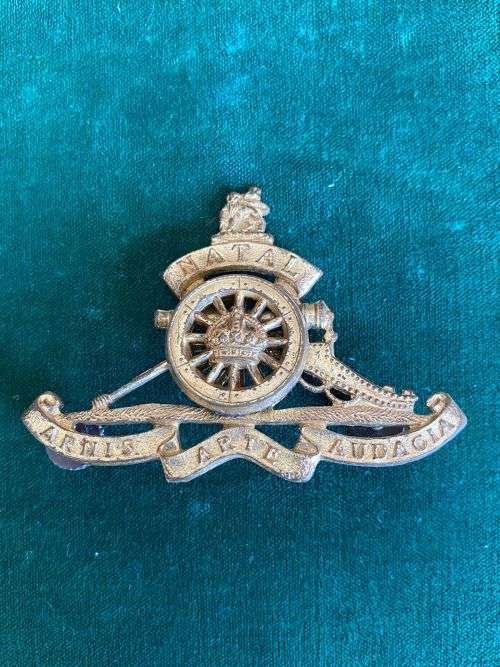 NATAL FIELD ARTILLERY,GILDING METAL CAP BADGE- WORN POST 1967-LARGE VARIATION- 2X SCREW LUGS