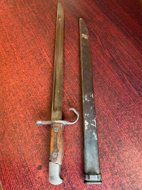 JAPAN EARLY PRODUCTION 30TH YEAR (1897) BAYONET/SWORD-IT HAS A ROUNDED POMMEL,SHAPED GRIPS AND A HOO