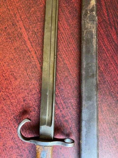 JAPAN EARLY PRODUCTION 30TH YEAR (1897) BAYONET/SWORD-IT HAS A ROUNDED POMMEL,SHAPED GRIPS AND A HOO