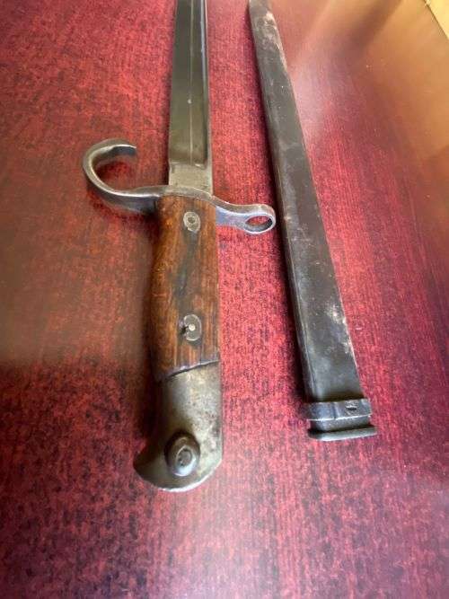 JAPAN EARLY PRODUCTION 30TH YEAR (1897) BAYONET/SWORD-IT HAS A ROUNDED POMMEL,SHAPED GRIPS AND A HOO