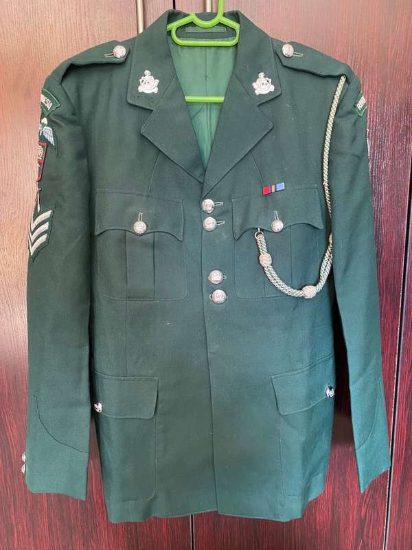 RHODESIAN GREENS,COMPLETE WITH TROUSERS,SAM BROWN AND PARADE RLI GLOVES-IT BELONGED TO DES JORDAAN-