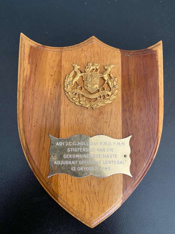A PLAQUE TO AO1 J.C.C. HOLLIDAY P.M.D. P.M.M.