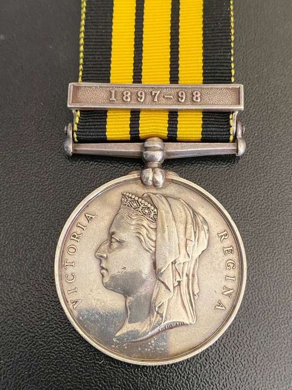 FULL SIZE (SILVER) EAST AND WEST AFRICA MEDAL WITH 1897-98 CLASP-AWARDED TO 675 PTR. SUANU AF01 LAGO