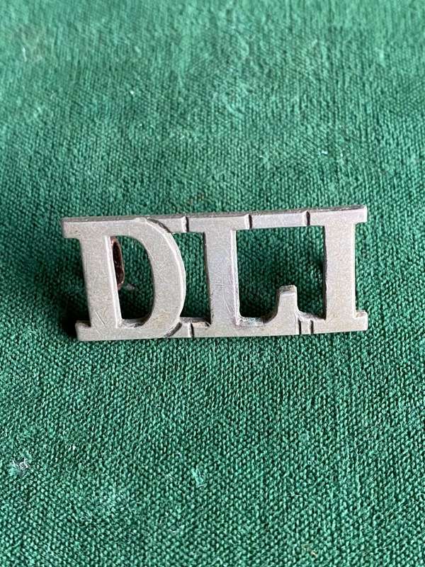 DURBAN LIGHT INFANTRY WHITE METAL SHOULDER TITLE-WORN 1897-1920- 2 LUGS