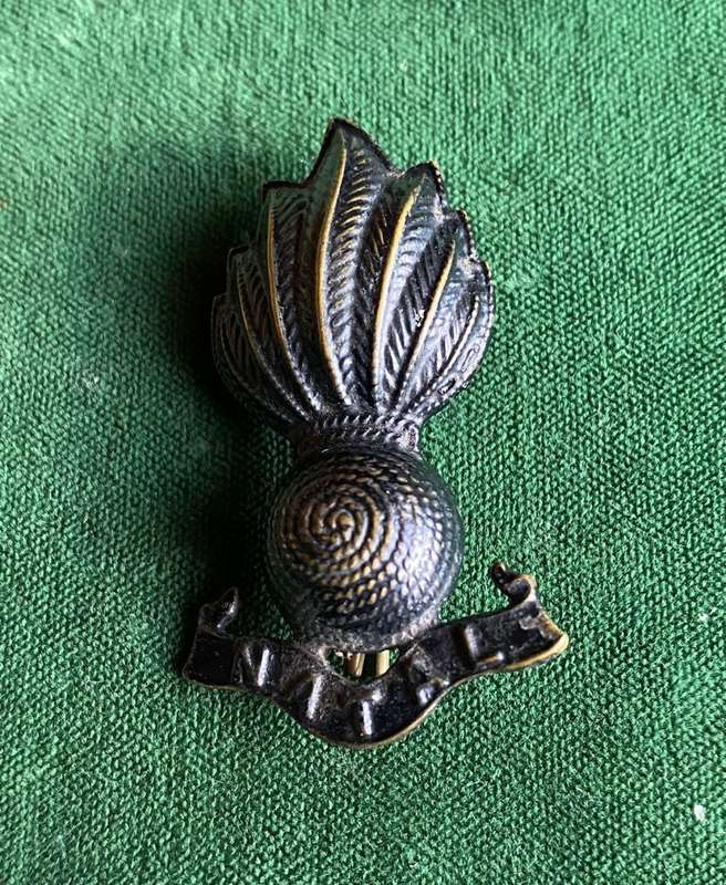 NATAL FIELD ARTILLERY BLACKENED BRONZE CAP BADGE AND COLLAR BADGES(ALSO LATER WORN AS CAP BADGE)APPR