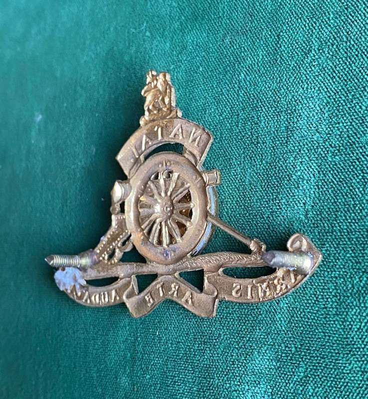 NATAL FIELD ARTILLERY CAP BADGE-ADOPTED IN 1967 GILDING METAL-WORN BY OTHER RANKS- 2 LUGS