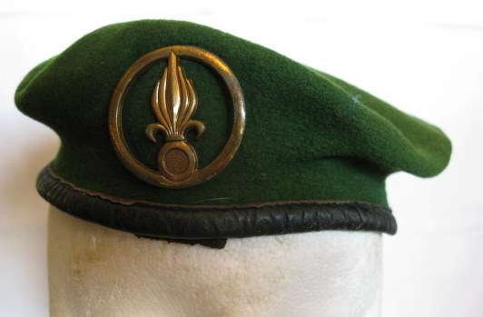FRENCH FOREIGN LEGION BERET WITH BADGE.  SIZE SMALL.
