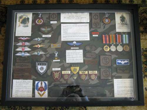 RECCE COLLECTION.  FRAMED RECCE COLLECTION WITH 43 ITEMS IN TOTAL.