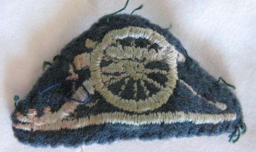 SOUTHERN RHODESIA WHITE EMBROIDERED ON DARK GREEN ARM BADGE.