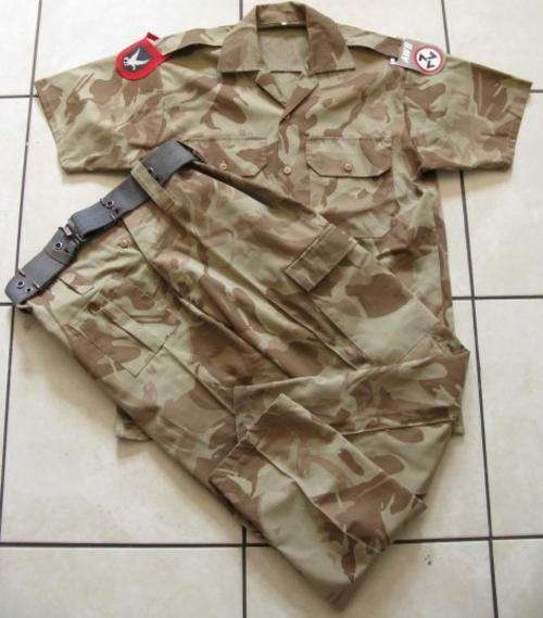 AWB UNIFORM SIZE MEDUIM MEASURES 55CM ARMPIT TO ARMPIT WITH SHOULDER PATCHES.