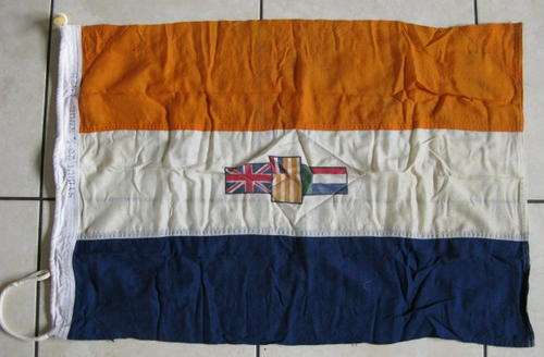 OLD S.A. STORM FLAG LABELLED & DATED 1979.  COMPLETE WITH TOGGLE ROPE.
