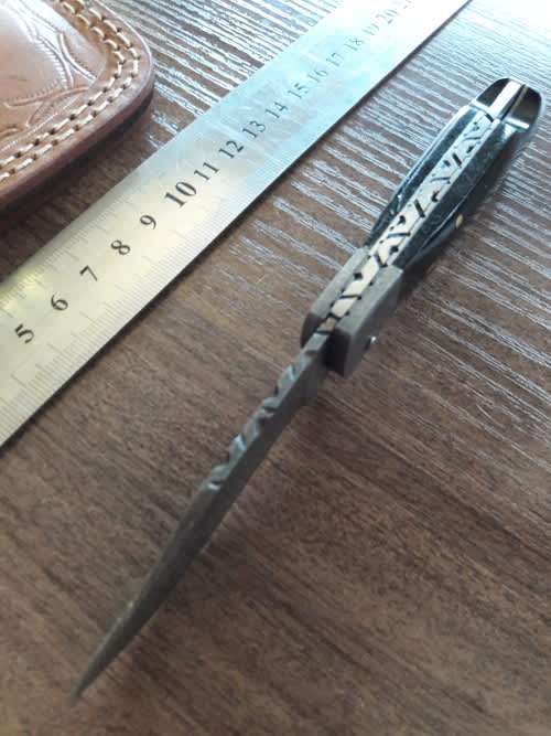 Handmade Damascus steel folding knife with BULL Horn handle scales