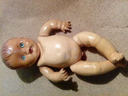 Antique 'Handle with Care' Doll - Marked on the Back