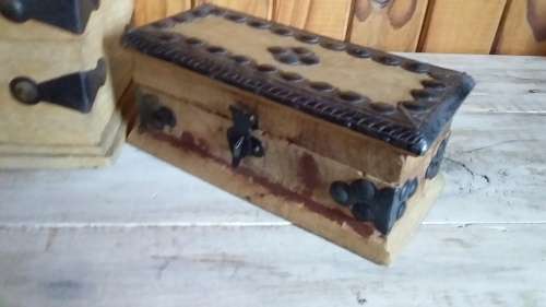 Three Carved Wooden Boxes with Metal Attachments