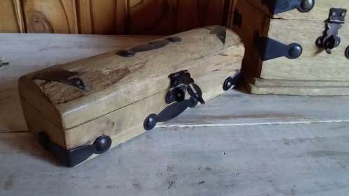 Three Carved Wooden Boxes with Metal Attachments