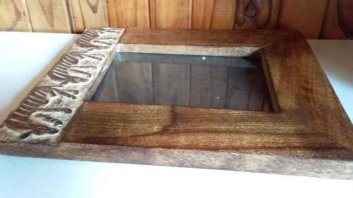 Thick Exotic Eood Frame with Carved Animals