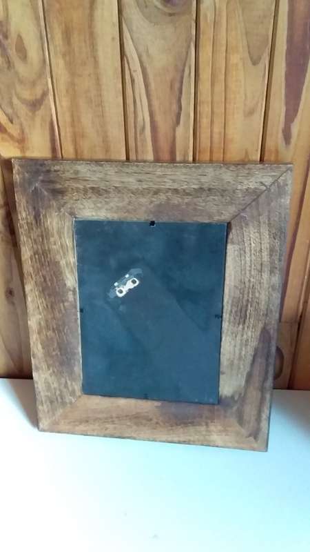 Thick Exotic Eood Frame with Carved Animals