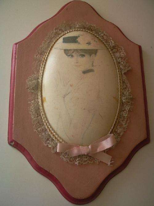 Lady with Hat in Oval Frame on Wooden Base