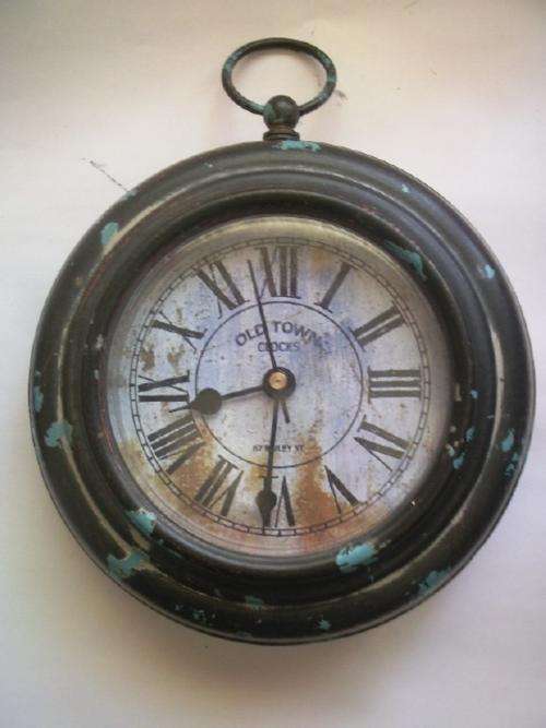 Small Circular Metal Clock