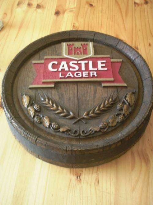 Circular Wood Effect Castle Lager Wall Hanging